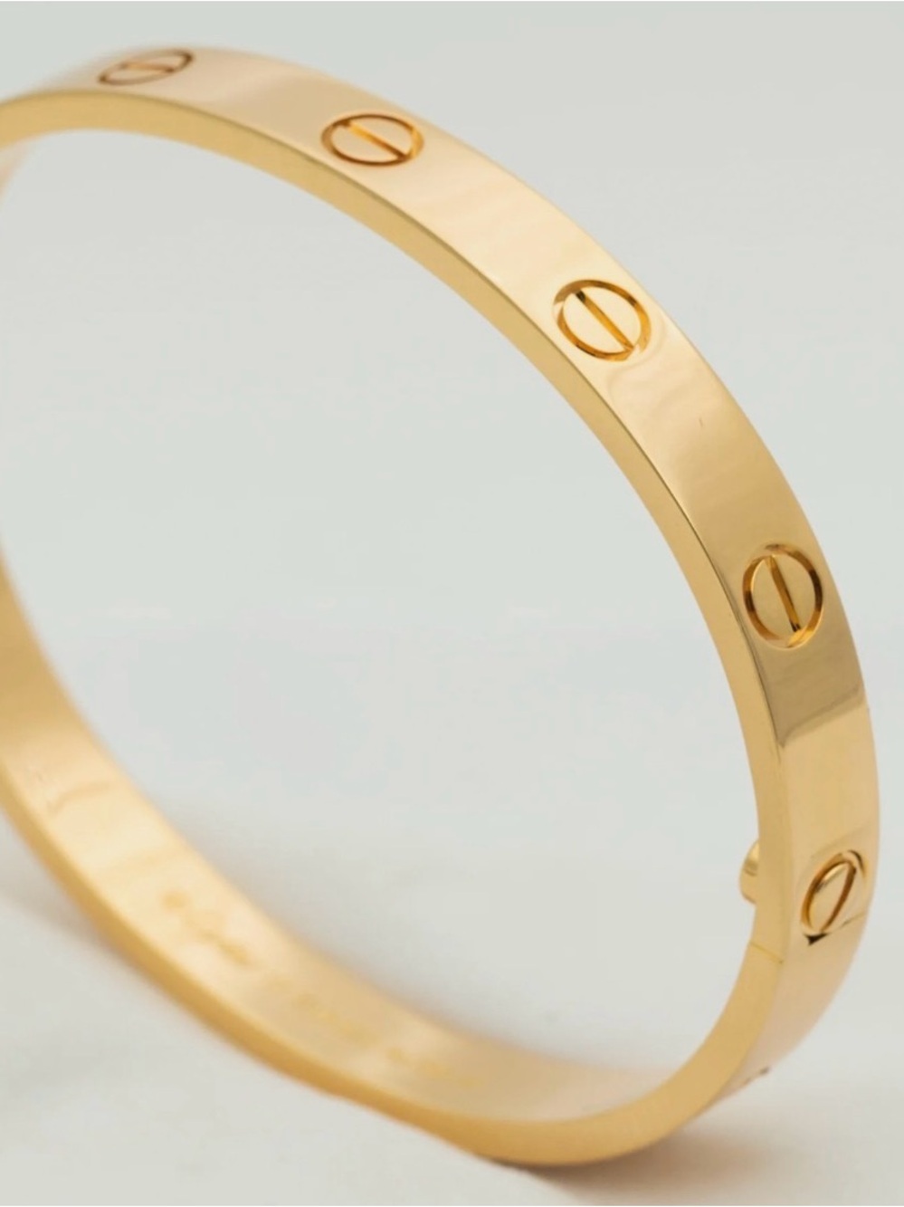 Cartier Gold Screw Motif Bangle